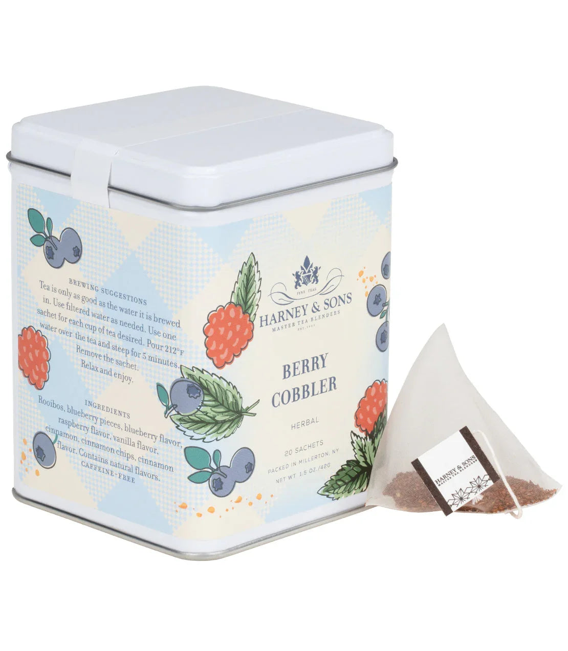 Harney & Sons Berry Cobbler herbal tea tin with illustrated berries and a pyramid tea sachet