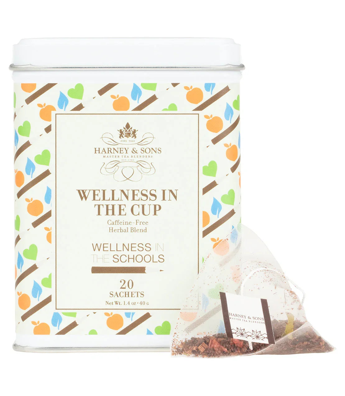 Harney & Sons Wellness in the Cup herbal tea tin with colorful fruit pattern and tea sachet