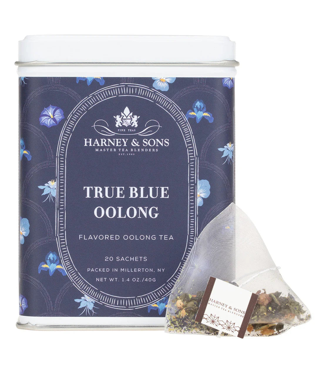 Harney & Sons True Blue Oolong tea tin with floral design and a tea sachet in front