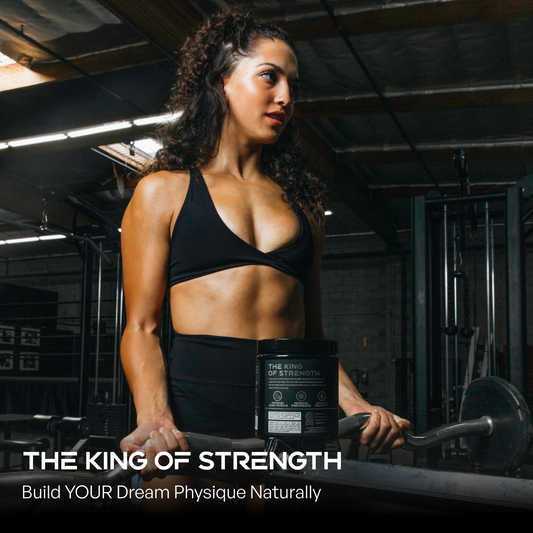 Woman holding a supplement container with gym equipment in the background