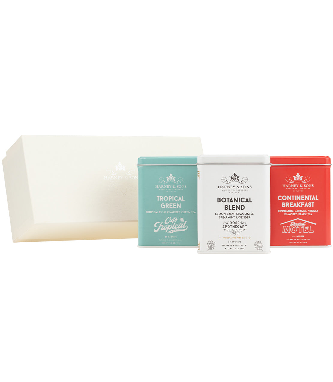 Set of three tea packages with different flavors on a white background