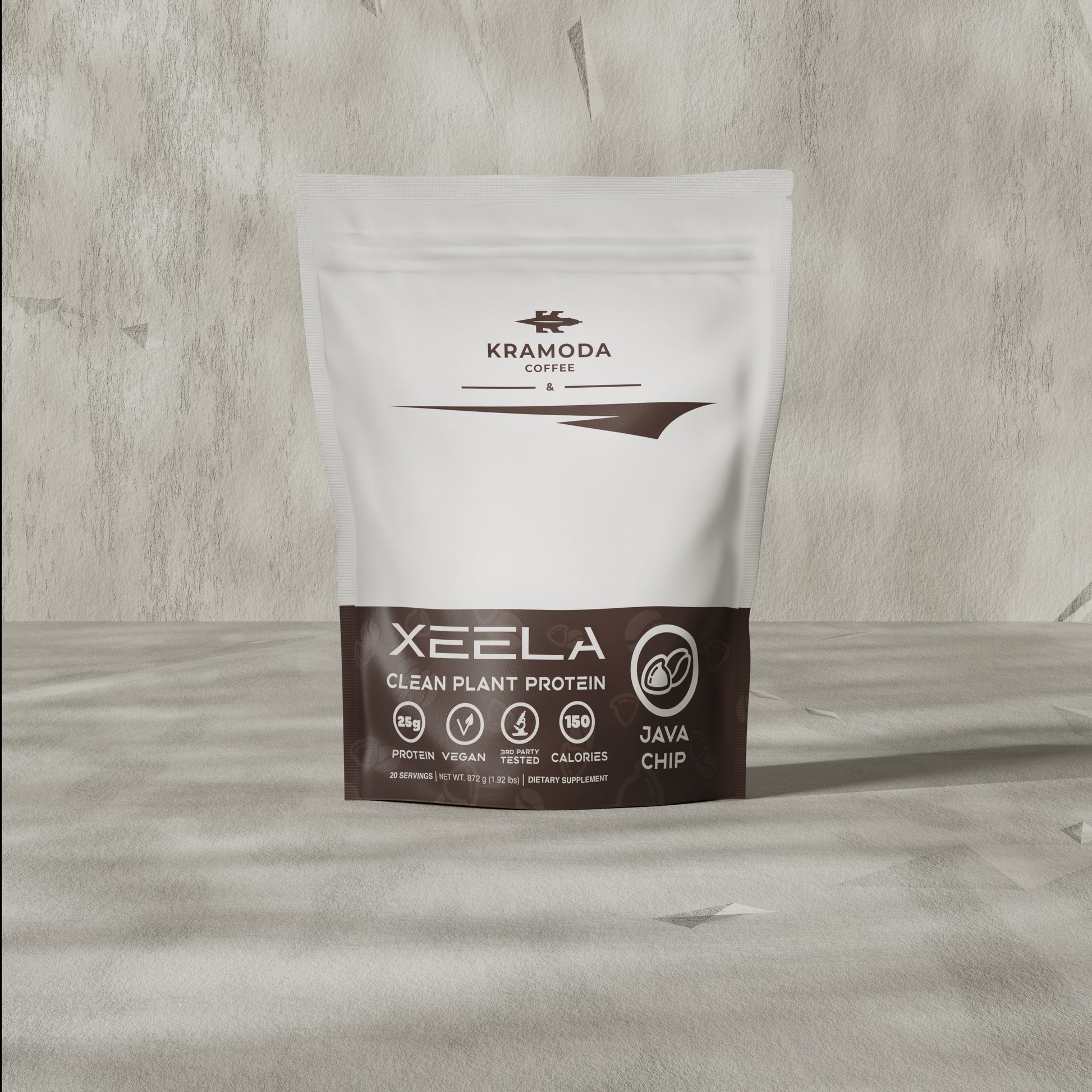 Kramoda Coffee Xeela Clean Plant Protein package on a wooden surface
