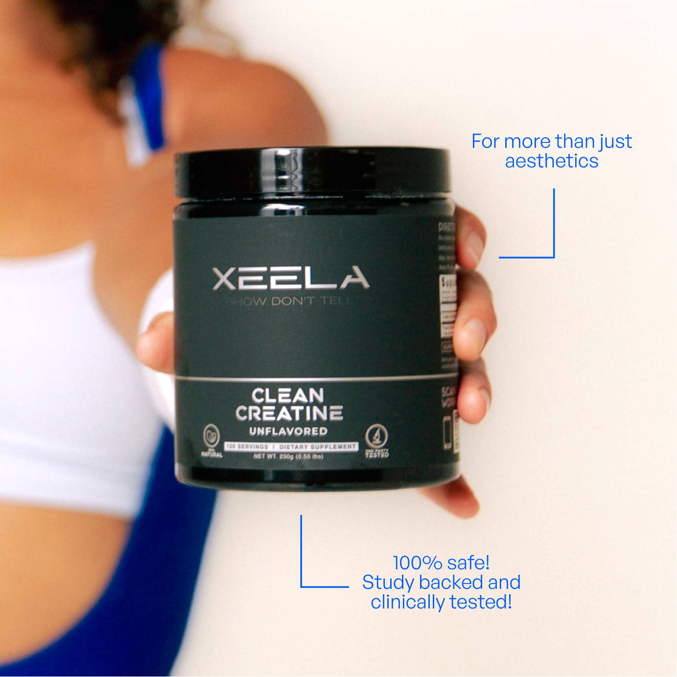 Person holding a XEELA Clean Creatine container with promotional text on a blurred background
