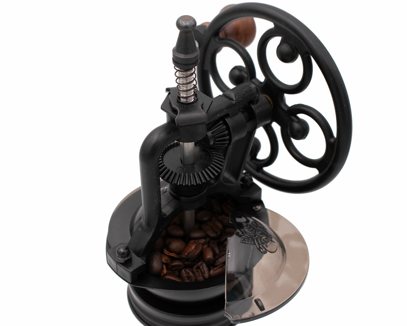Vintage-style coffee grinder with coffee beans on a white background